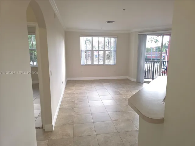 a view of entryway and hall with a window