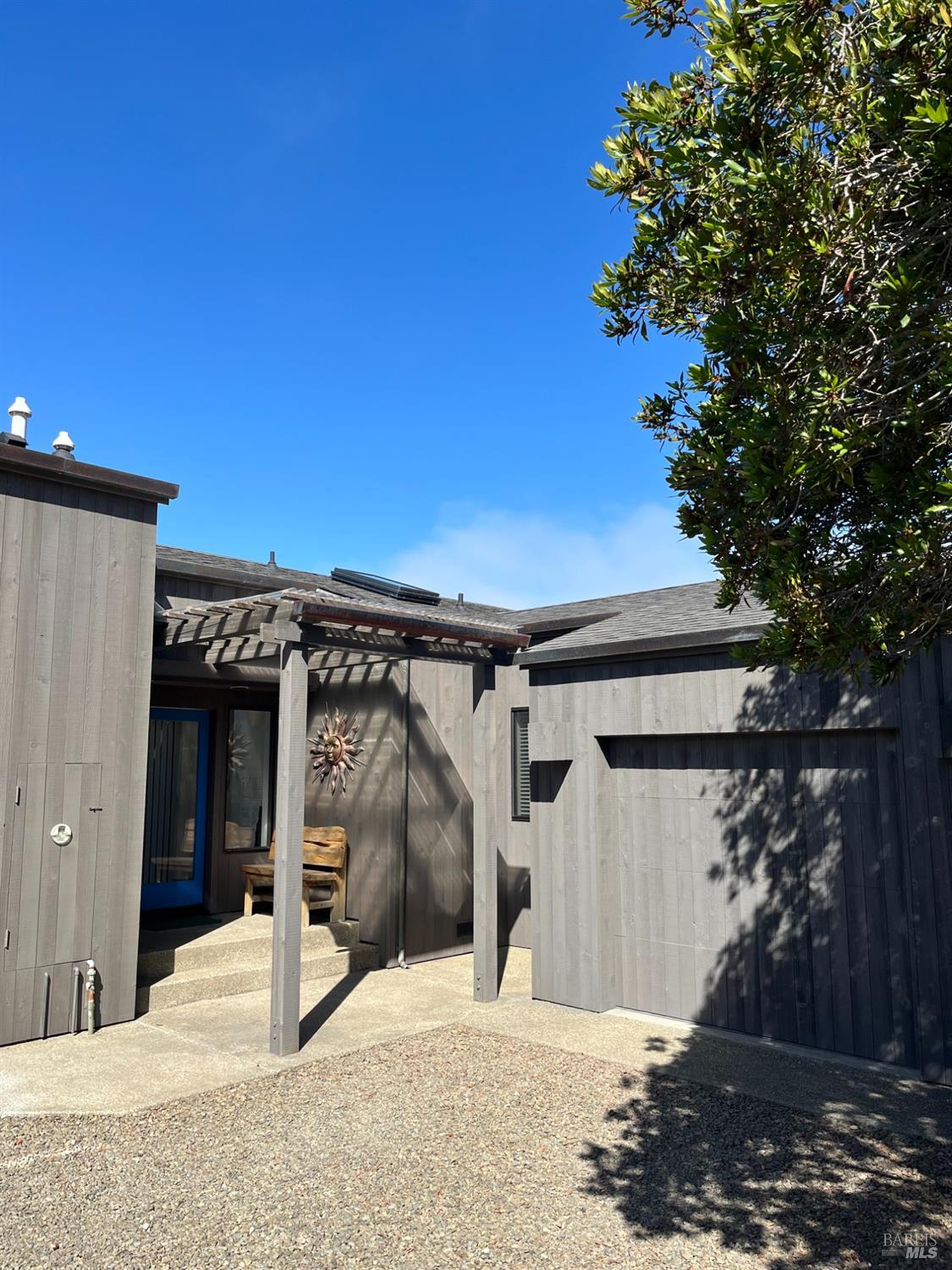 39722 Leeward Road, Unit 28 The Sea Ranch, CA 95497 - Photo 14 of 36 a view of a house with a garage
