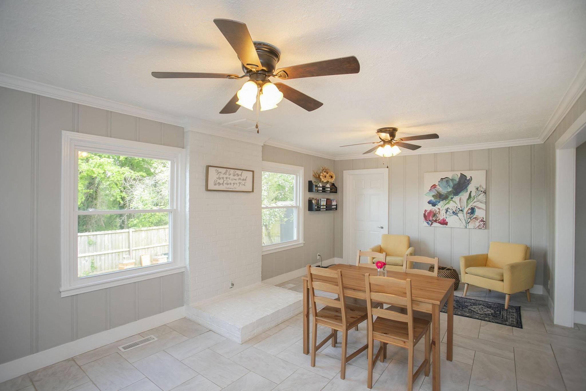 806 Fleming Street Columbia, TN 38401 - Photo 18 of 54 a dining room with furniture a chandelier and a window