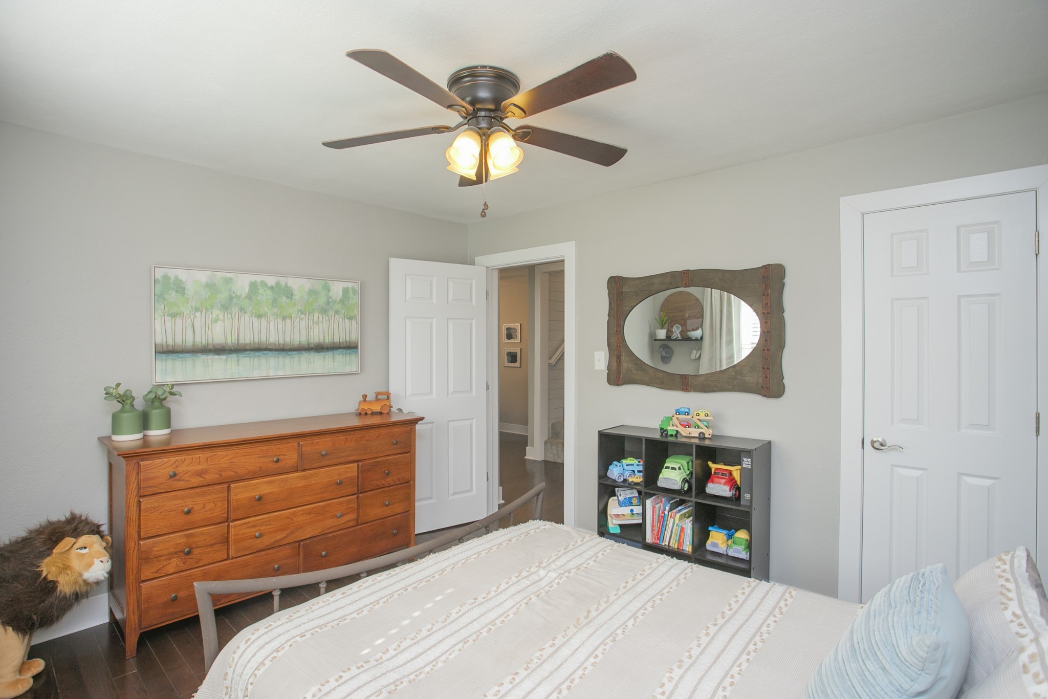 806 Fleming Street Columbia, TN 38401 - Photo 27 of 54 a bedroom with a bed and a chandelier