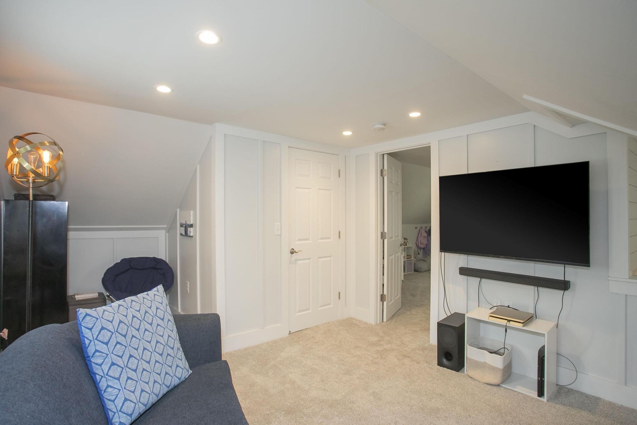 806 Fleming Street Columbia, TN 38401 - Photo 35 of 54 a living room with furniture and a flat screen tv