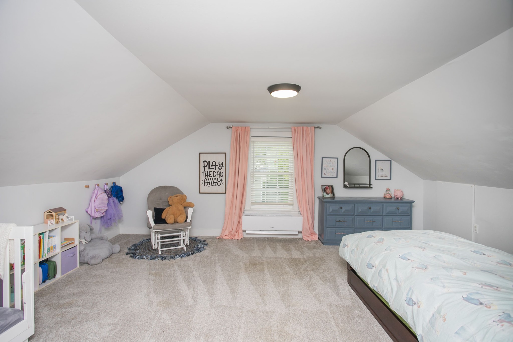 806 Fleming Street Columbia, TN 38401 - Photo 39 of 54 a bedroom with a bed and dresser