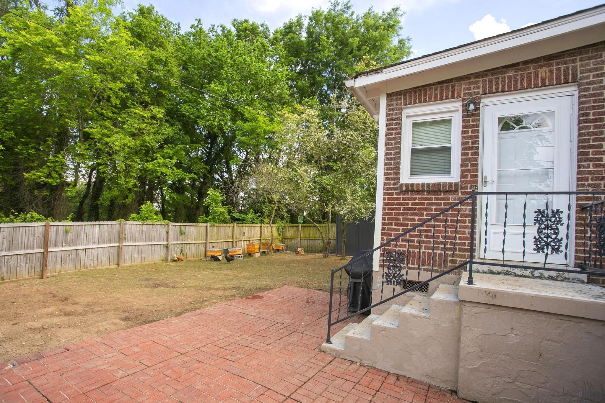 806 Fleming Street Columbia, TN 38401 - Photo 48 of 54 a view of a house with backyard and a tree