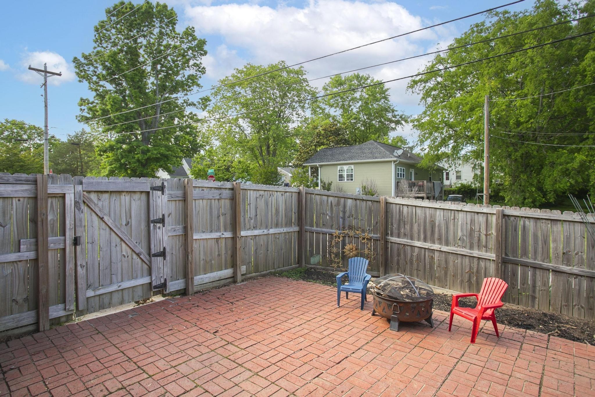 806 Fleming Street Columbia, TN 38401 - Photo 51 of 54 a view of a backyard with a small deck and a garden