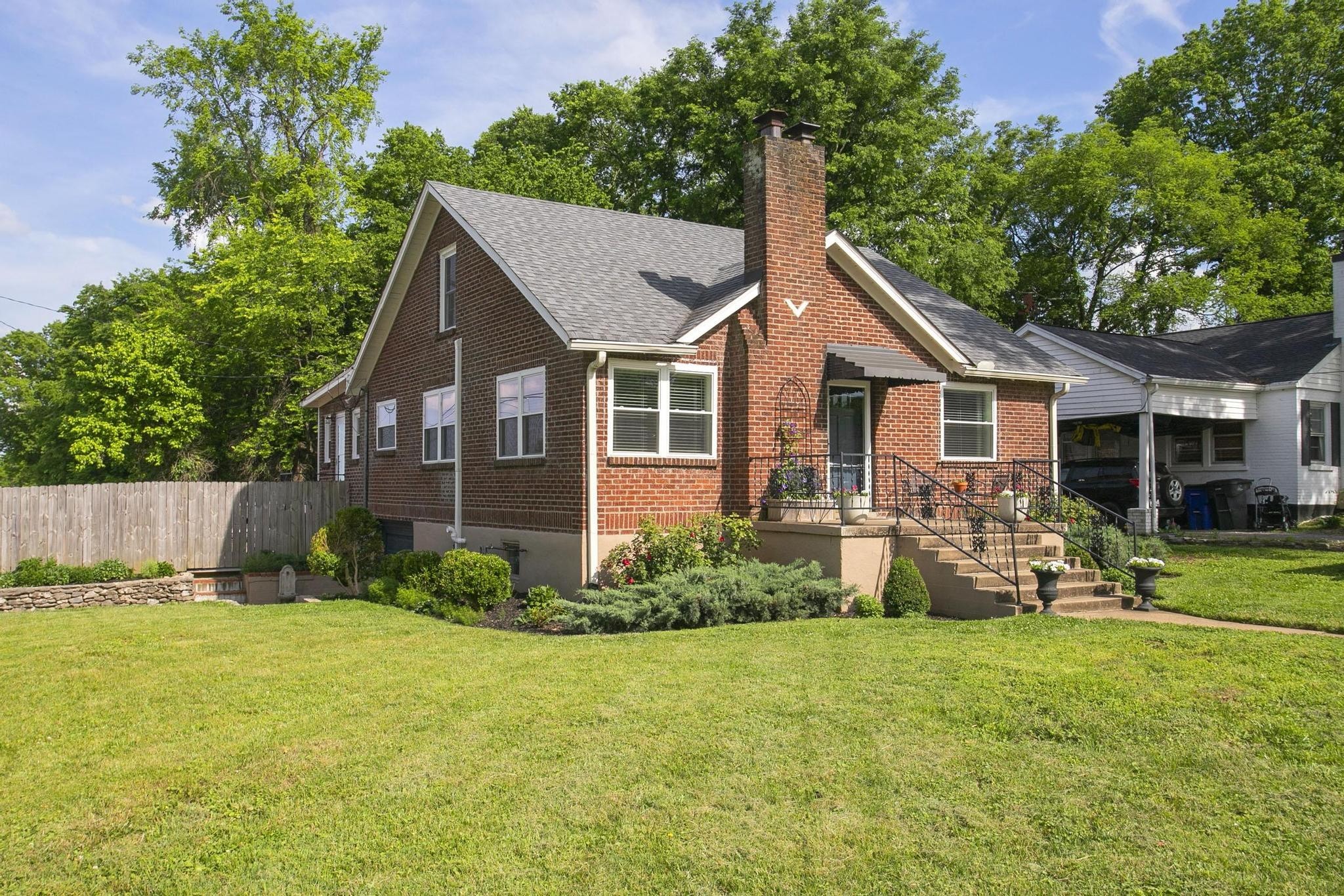 806 Fleming Street Columbia, TN 38401 - Photo 54 of 54 a front view of a house with a garden and yard