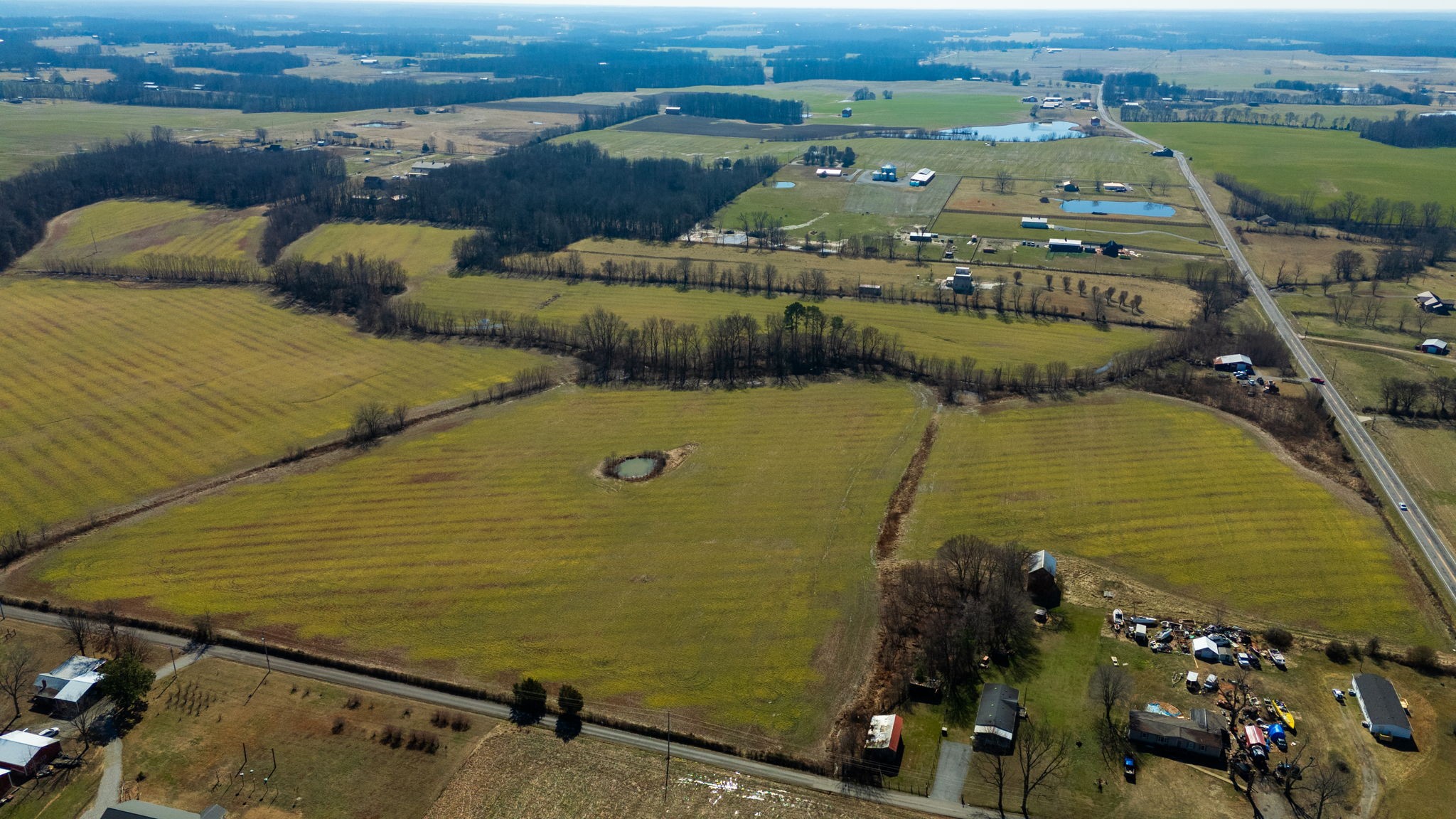 1902 Kinneys Road Adams, TN 37010 - Photo 23 of 59 an aerial view of a house with a lake view