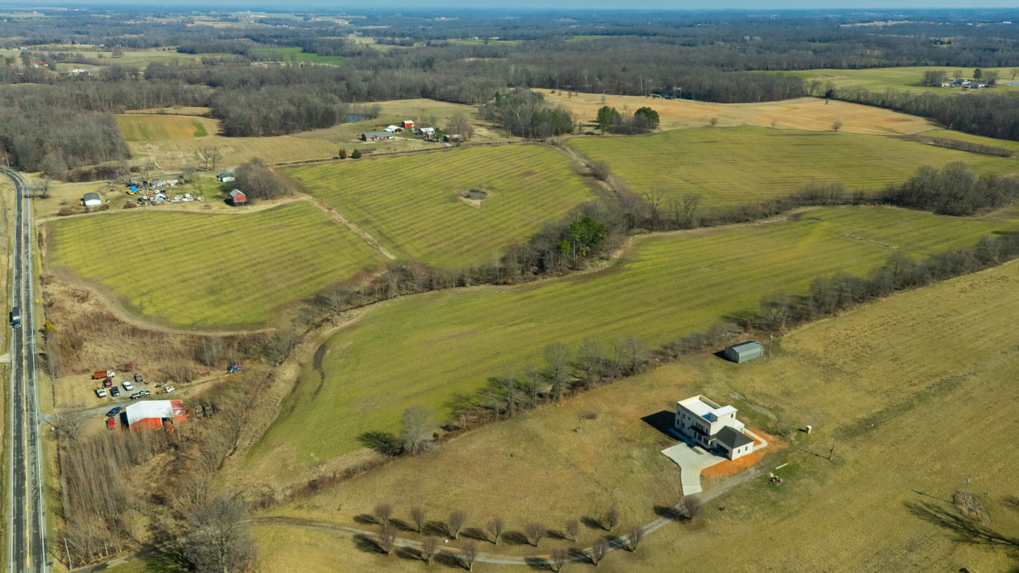 1902 Kinneys Road Adams, TN 37010 - Photo 54 of 59 an aerial view of a house with a yard