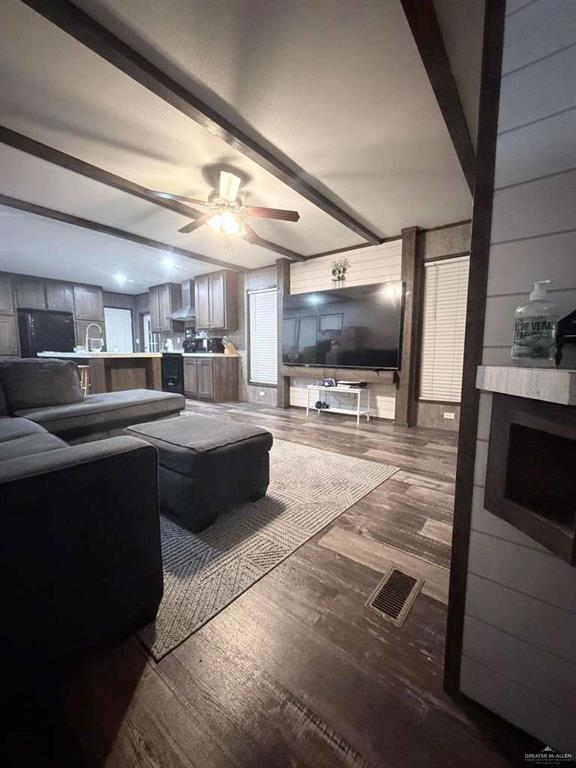 8511 Western Road Mission, TX 78574 - Photo 3 of 15 a large kitchen with stainless steel appliances kitchen island granite countertop a large counter top and stove top oven