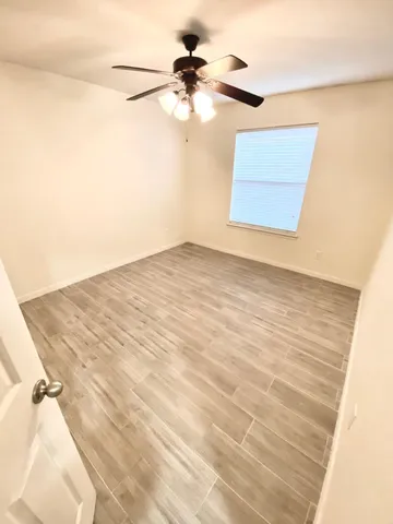 a view of a big room with carpet