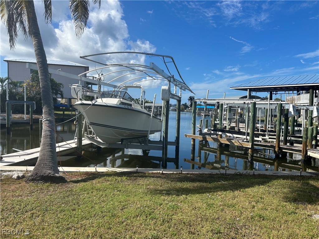 2635 York Road St. James City, FL 33956 - Photo 5 of 6 a view of a swimming pool with a patio