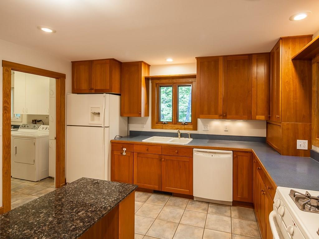 73 Loop Road Otisfield, ME 04270 - Photo 14 of 35 kitchen is off the great room. ...