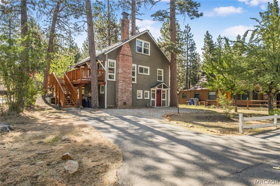 195 Elgin Road Big Bear Lake, CA 92315 - Photo 3 of 45 a front view of a house with a yard