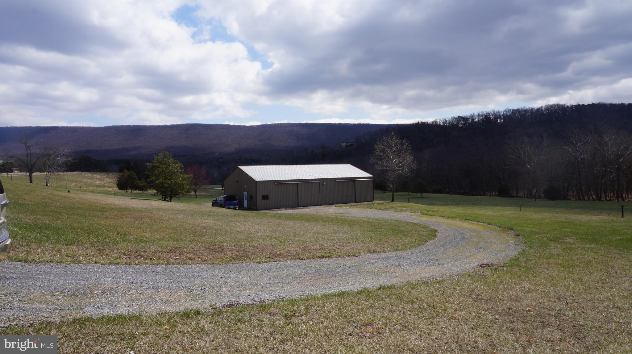 3595 Spohrs Road Berkeley Springs, WV 25411 - Photo 1 of 13 Exterior (General)