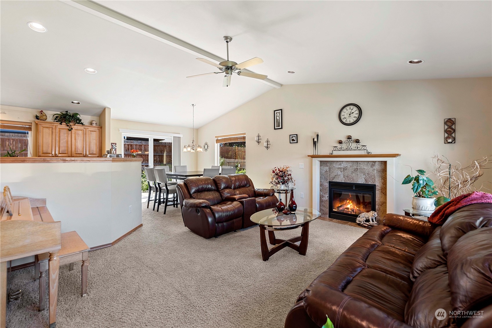 547 Saddle Rock Loop Wenatchee, WA 98801 - Photo 6 of 36 a living room with furniture and a fireplace