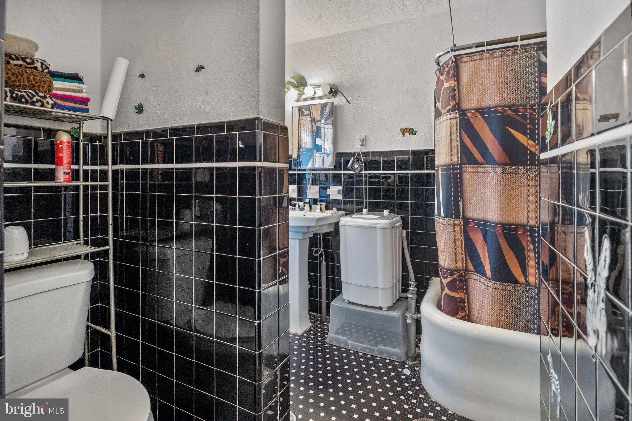 250 Washington Street Morrisville, PA 19067 - Photo 13 of 27 a bathroom with a toilet and a shower