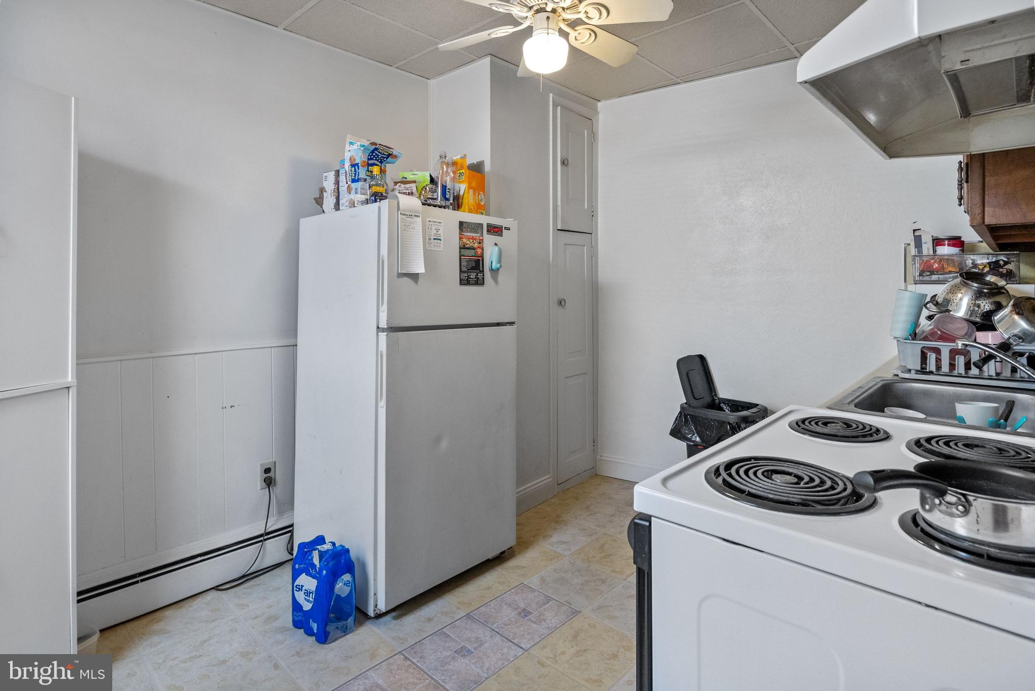 250 Washington Street Morrisville, PA 19067 - Photo 14 of 27 a white refrigerator freezer sitting inside of a kitchen