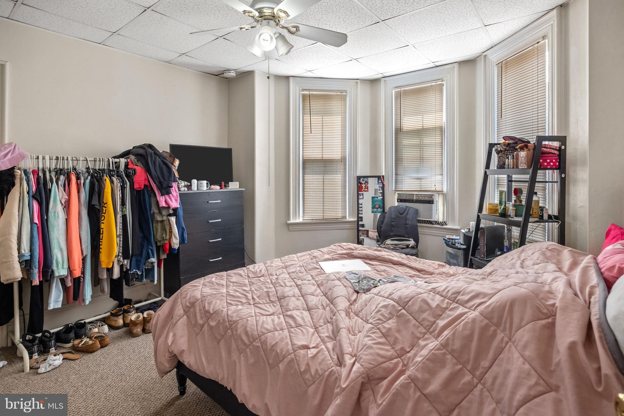 250 Washington Street Morrisville, PA 19067 - Photo 17 of 27 a bed sitting in a bedroom next to a window