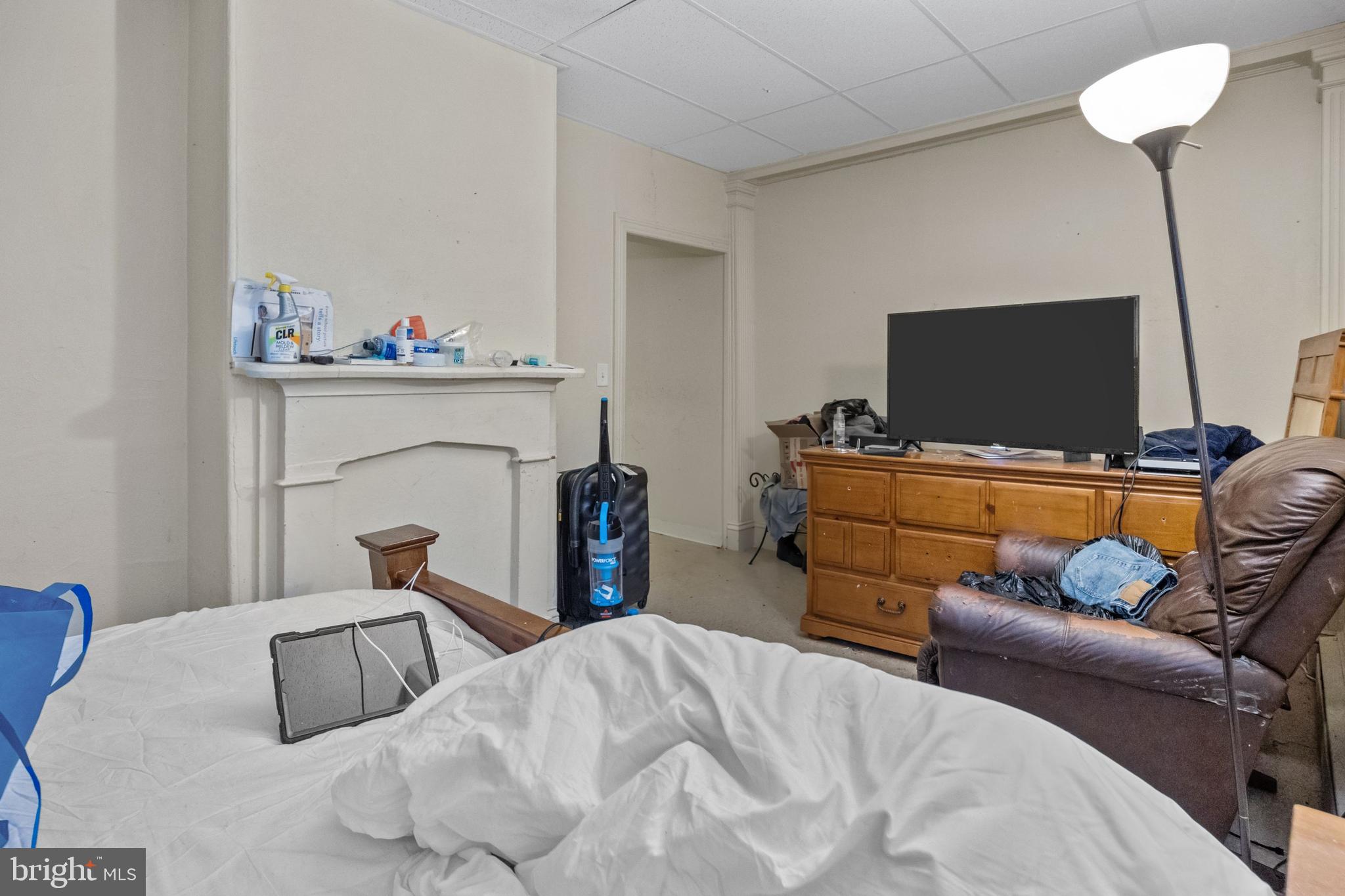 250 Washington Street Morrisville, PA 19067 - Photo 21 of 27 a bedroom with a bed and a flat screen tv