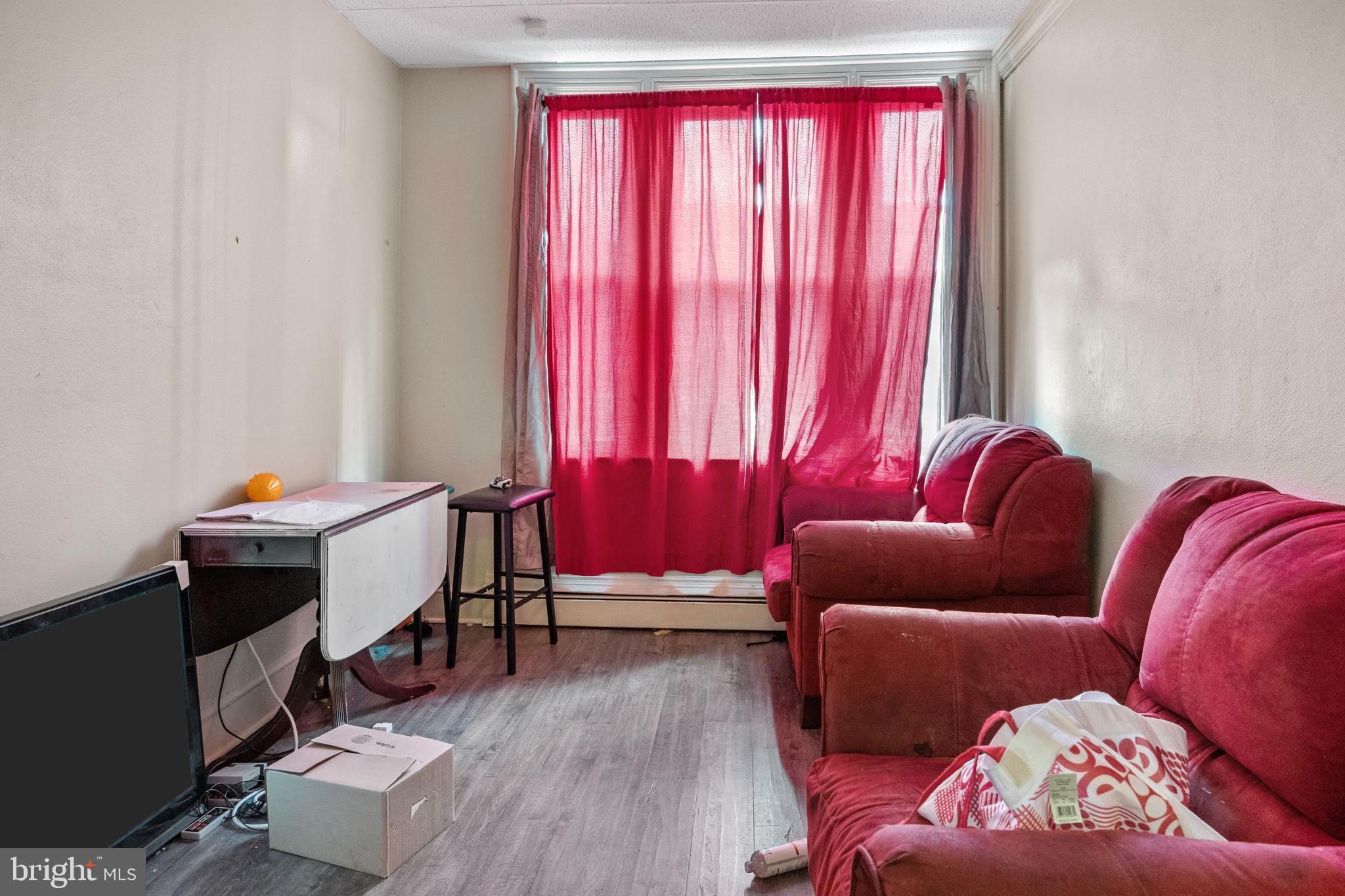 250 Washington Street Morrisville, PA 19067 - Photo 22 of 27 a living room with furniture and a window
