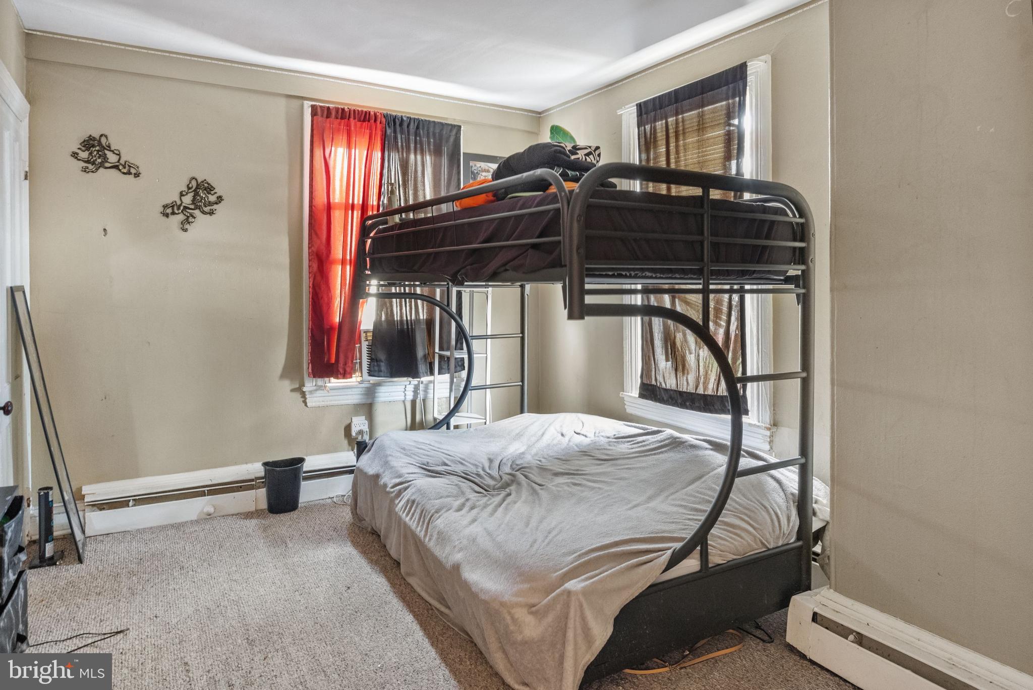 250 Washington Street Morrisville, PA 19067 - Photo 4 of 27 a bedroom with a bed and a window