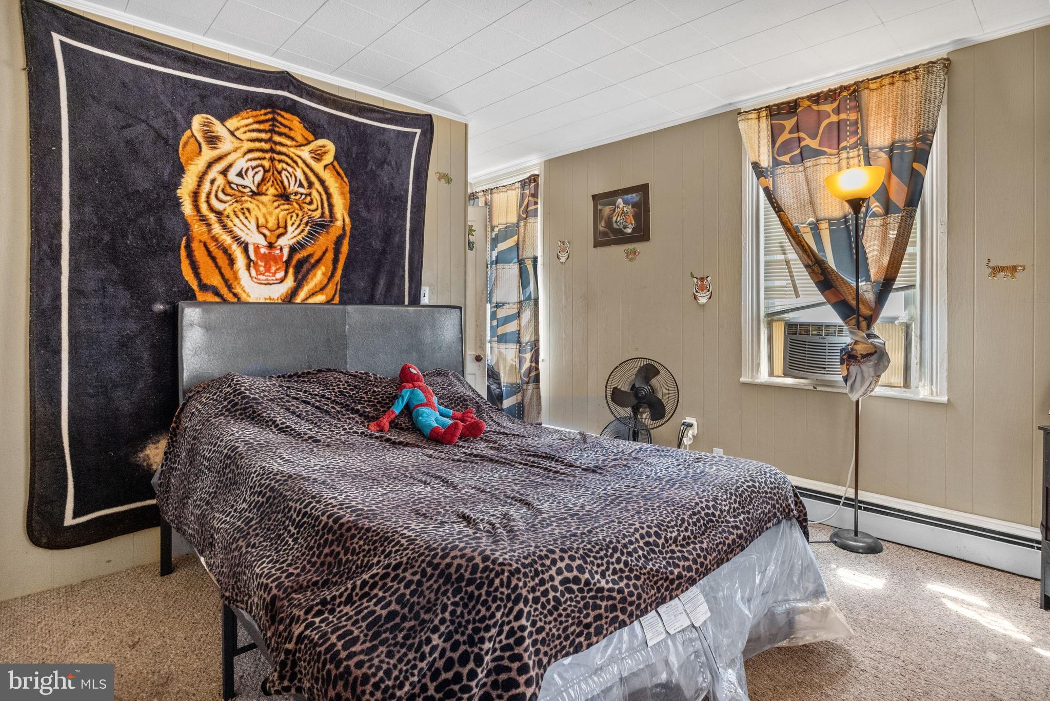 250 Washington Street Morrisville, PA 19067 - Photo 7 of 27 a bed sitting in a bedroom next to a window