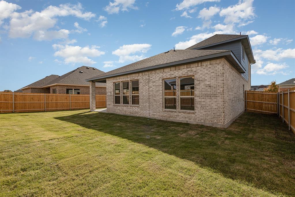 212 Painted Trail Forney, TX 75126 - Photo 26 of 26 a house view with a garden space