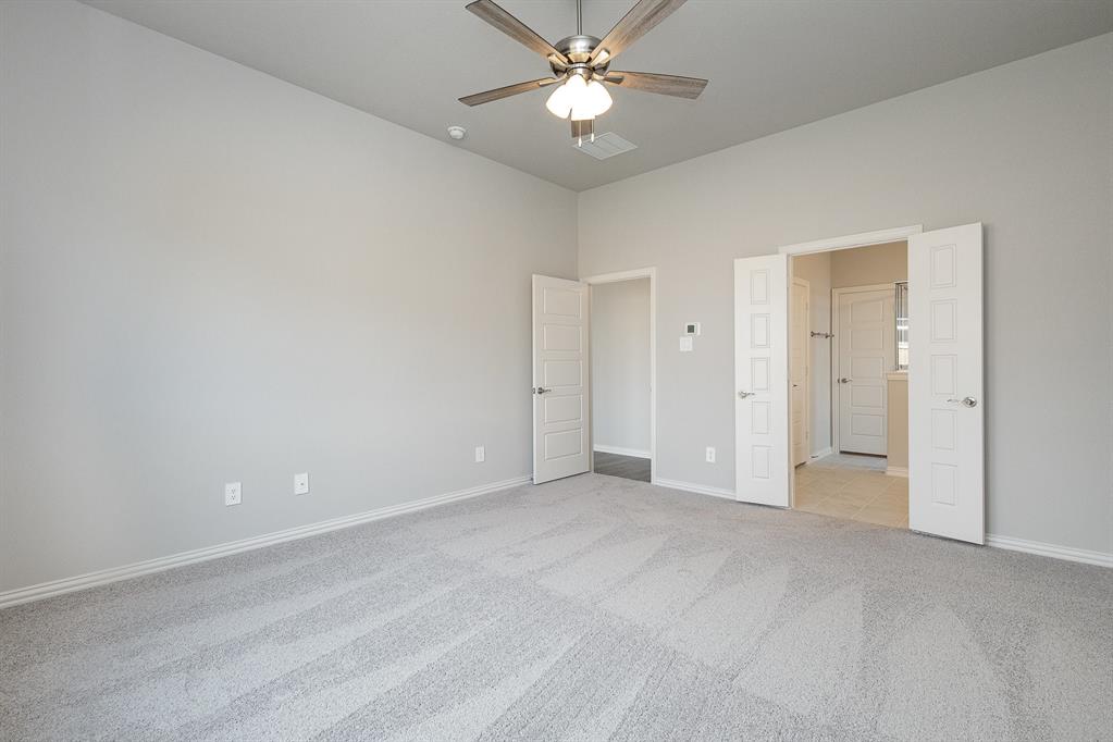 212 Painted Trail Forney, TX 75126 - Photo 9 of 26 a view of an empty room