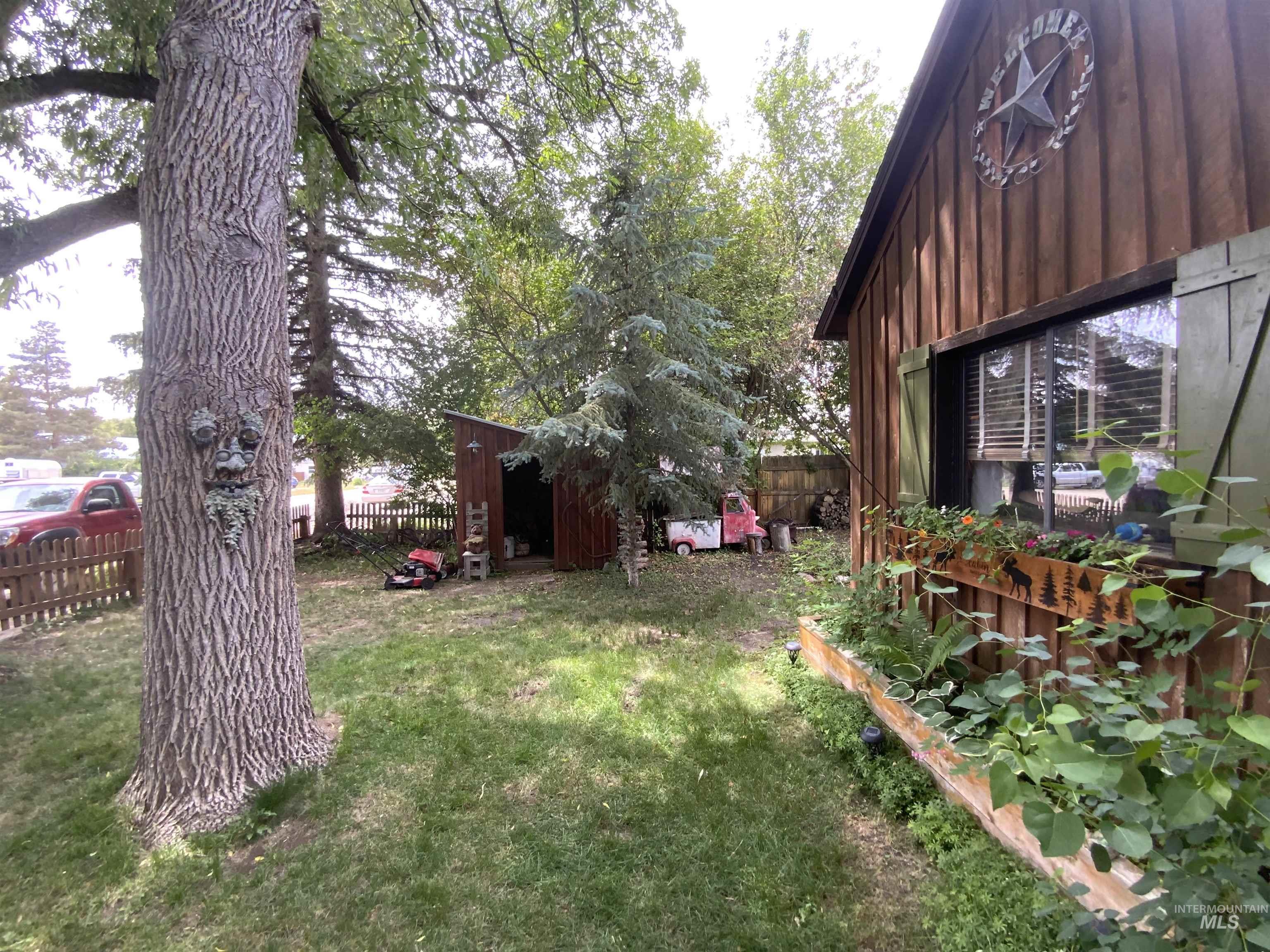 205 Alturas Avenue East Fairfield, ID 83327 - Photo 10 of 39 Fenced backyard with a shed