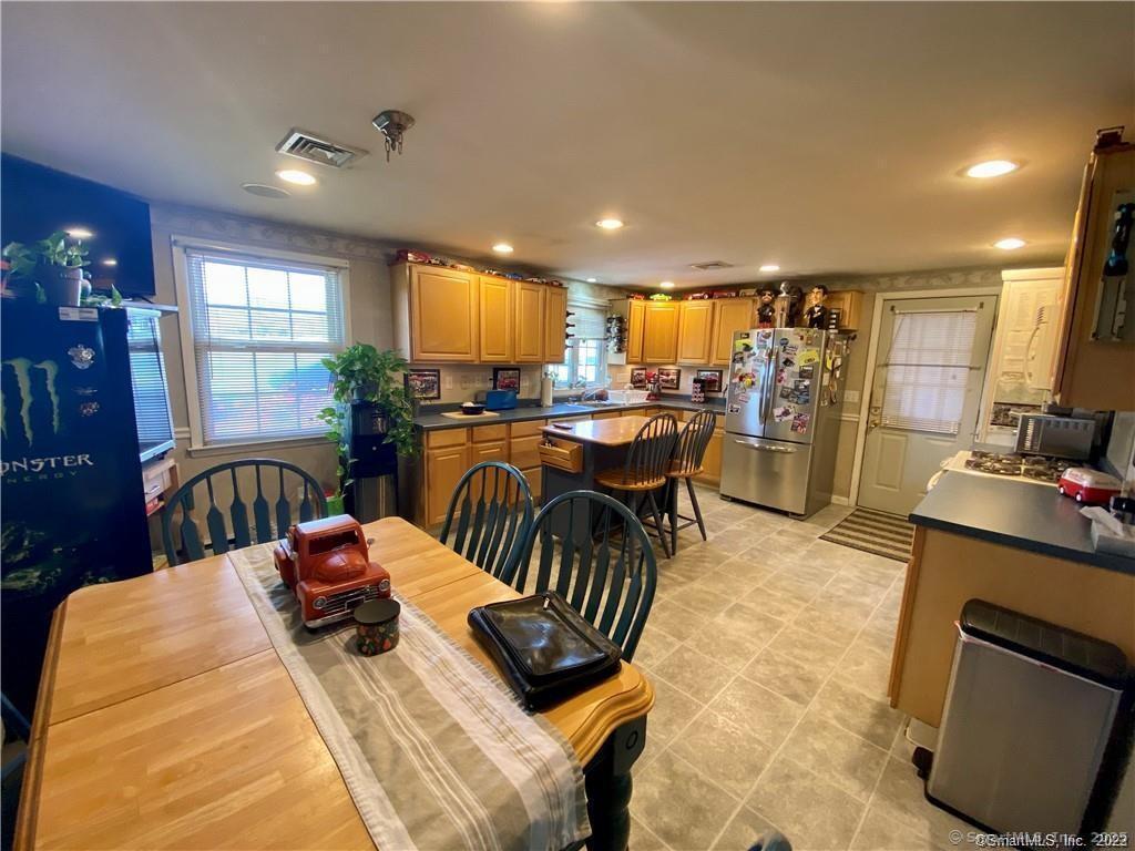 10 Russell Road East Granby, CT 06026 - Photo 22 of 30 a view of a dining room with furniture