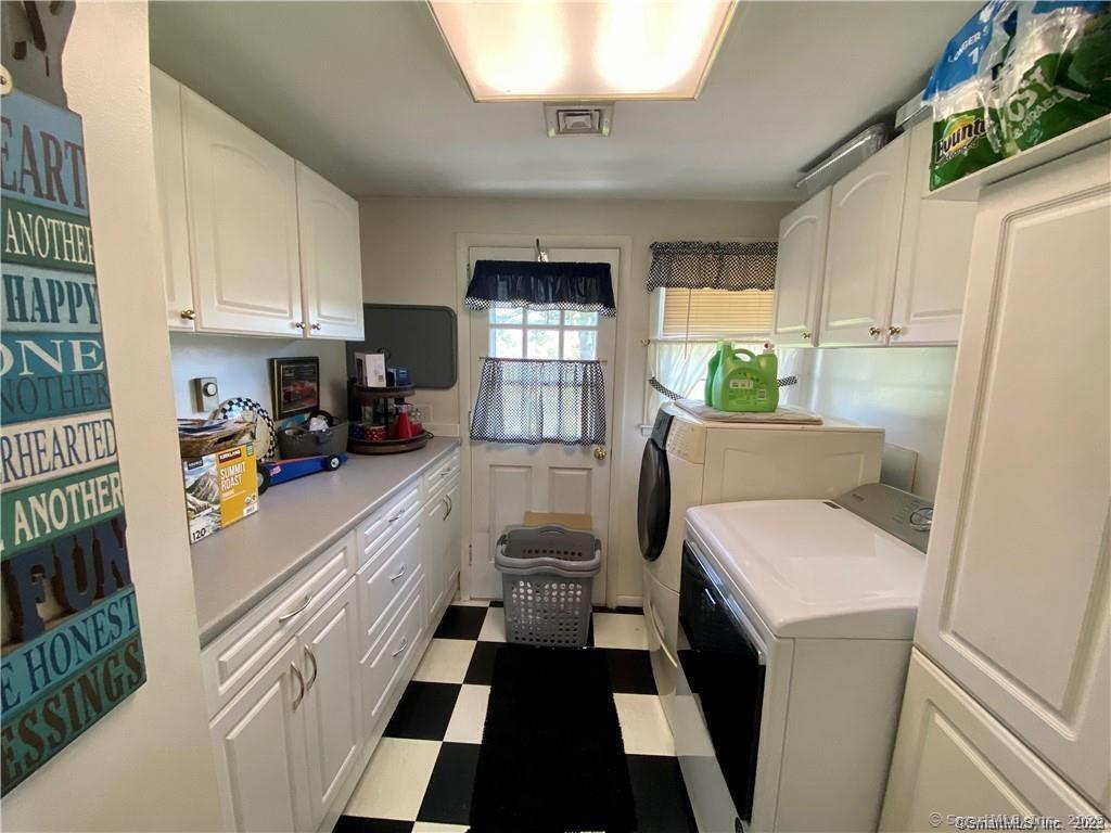 10 Russell Road East Granby, CT 06026 - Photo 23 of 30 a kitchen with a sink a stove a refrigerator and a cabinets