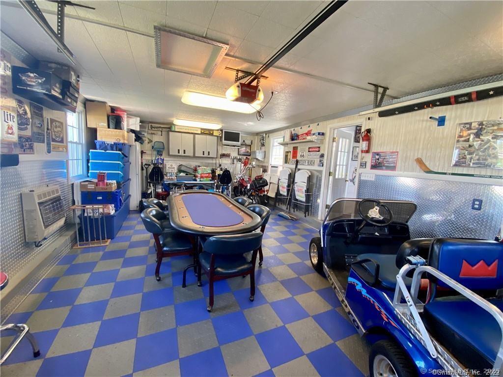 10 Russell Road East Granby, CT 06026 - Photo 25 of 30 a dining room with a table and chairs