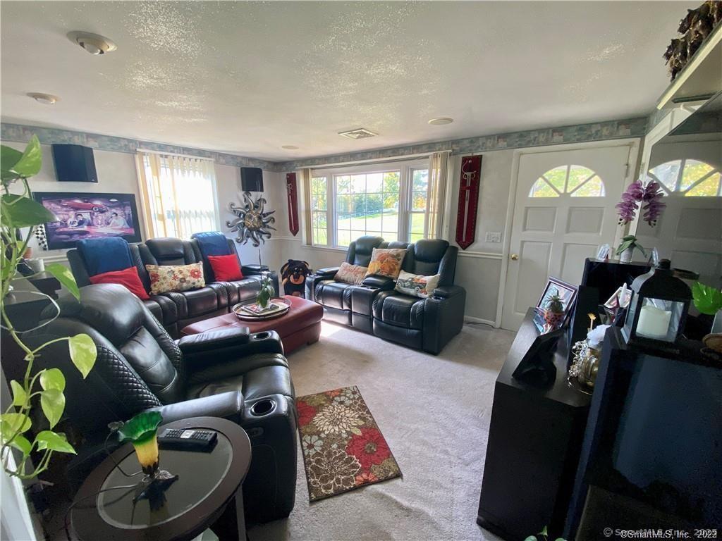 10 Russell Road East Granby, CT 06026 - Photo 27 of 30 a living room with furniture and a window