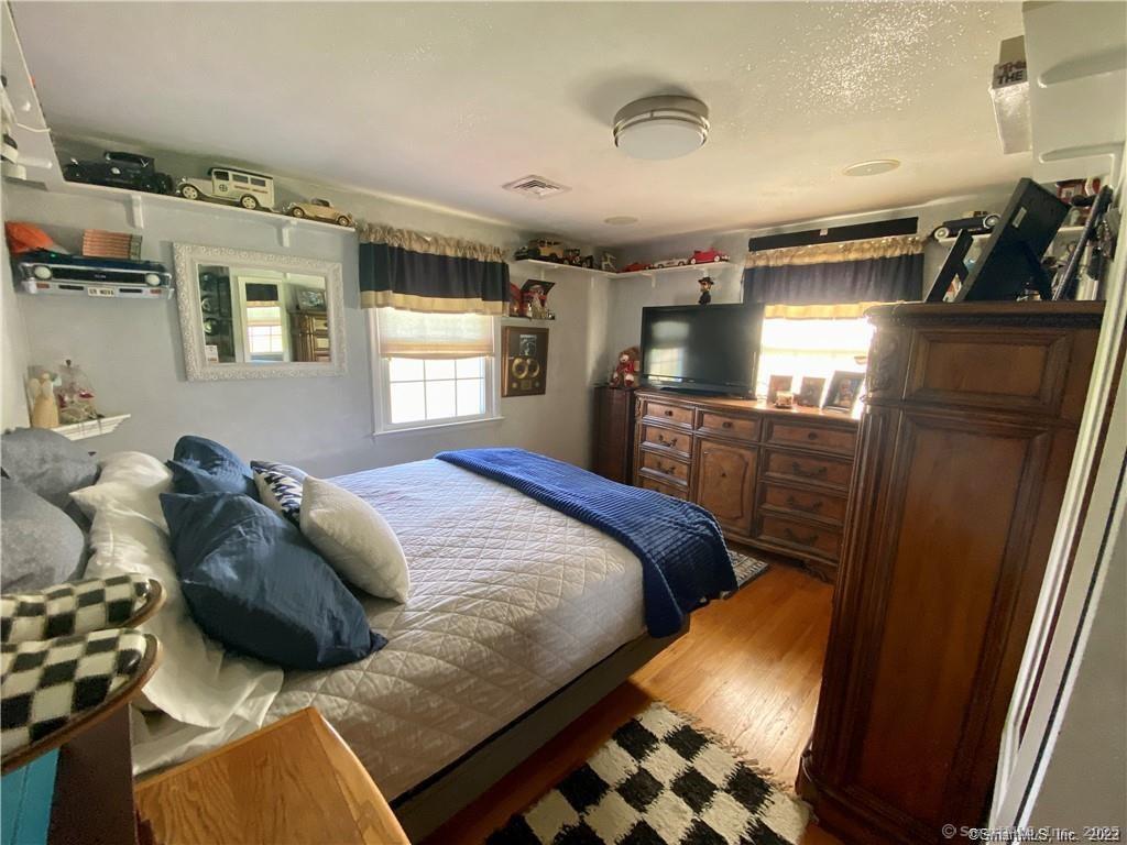 10 Russell Road East Granby, CT 06026 - Photo 28 of 30 a bed sitting in a bedroom next to a window