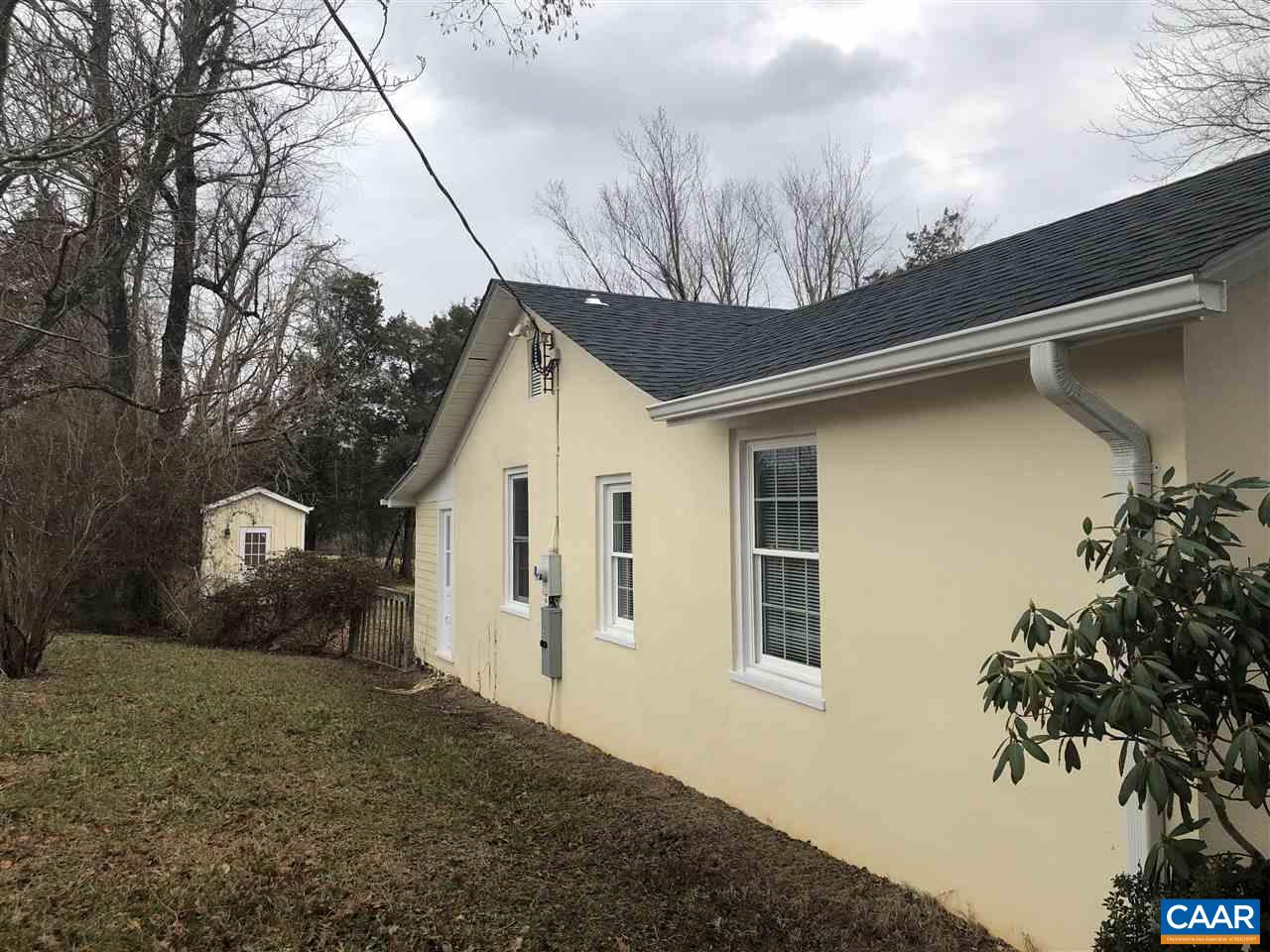 784 Poplar Spring Road Scottsville, VA 24590 - Photo 23 of 25 a view of a house with a yard
