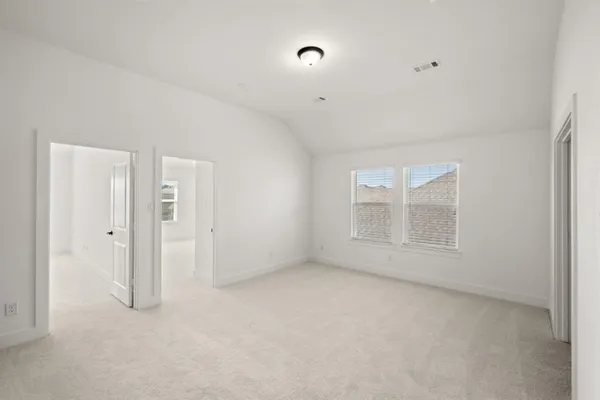 a view of empty room with windows