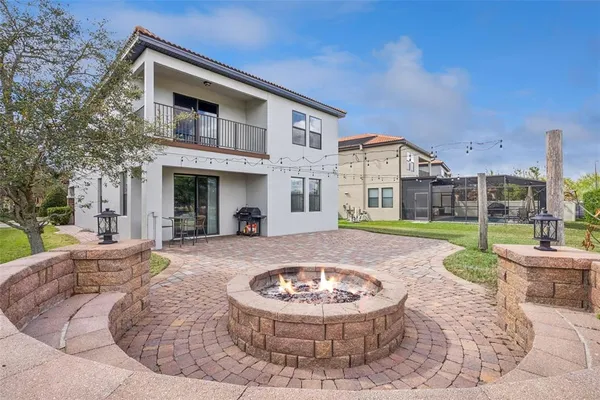 a utility room with cabinets washer and dryer