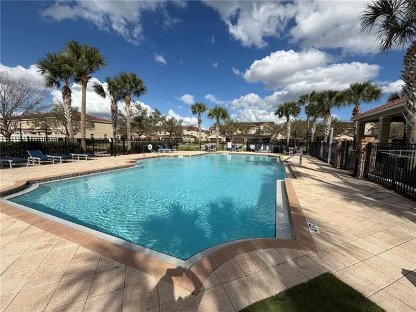 a view of a house with swimming pool