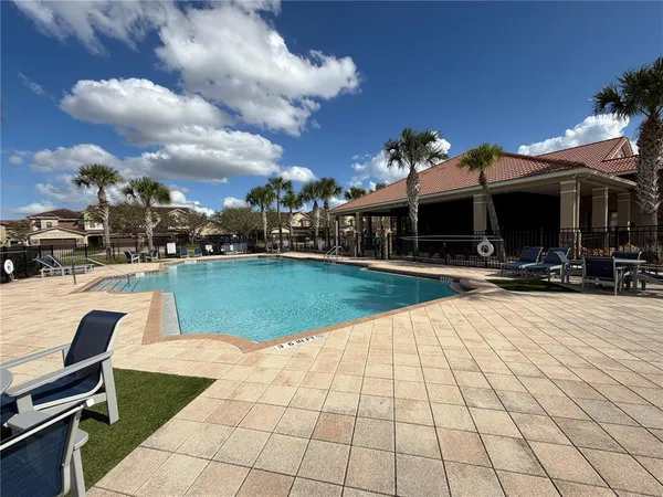 a view of a house with a swimming pool