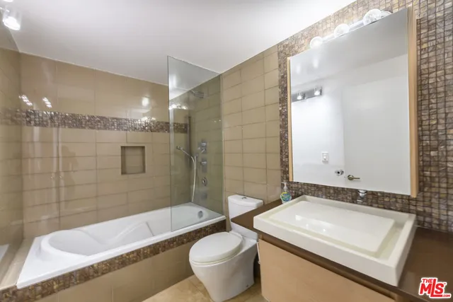 a bathroom with a sink and bathtub