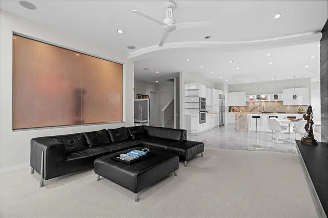 a room with gym equipment and a large window