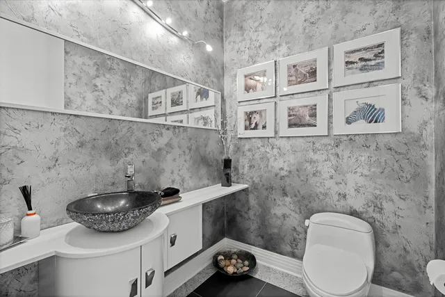 a bathroom with a bathtub and a sink