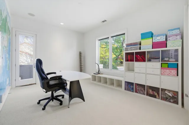 a view of a house with a street