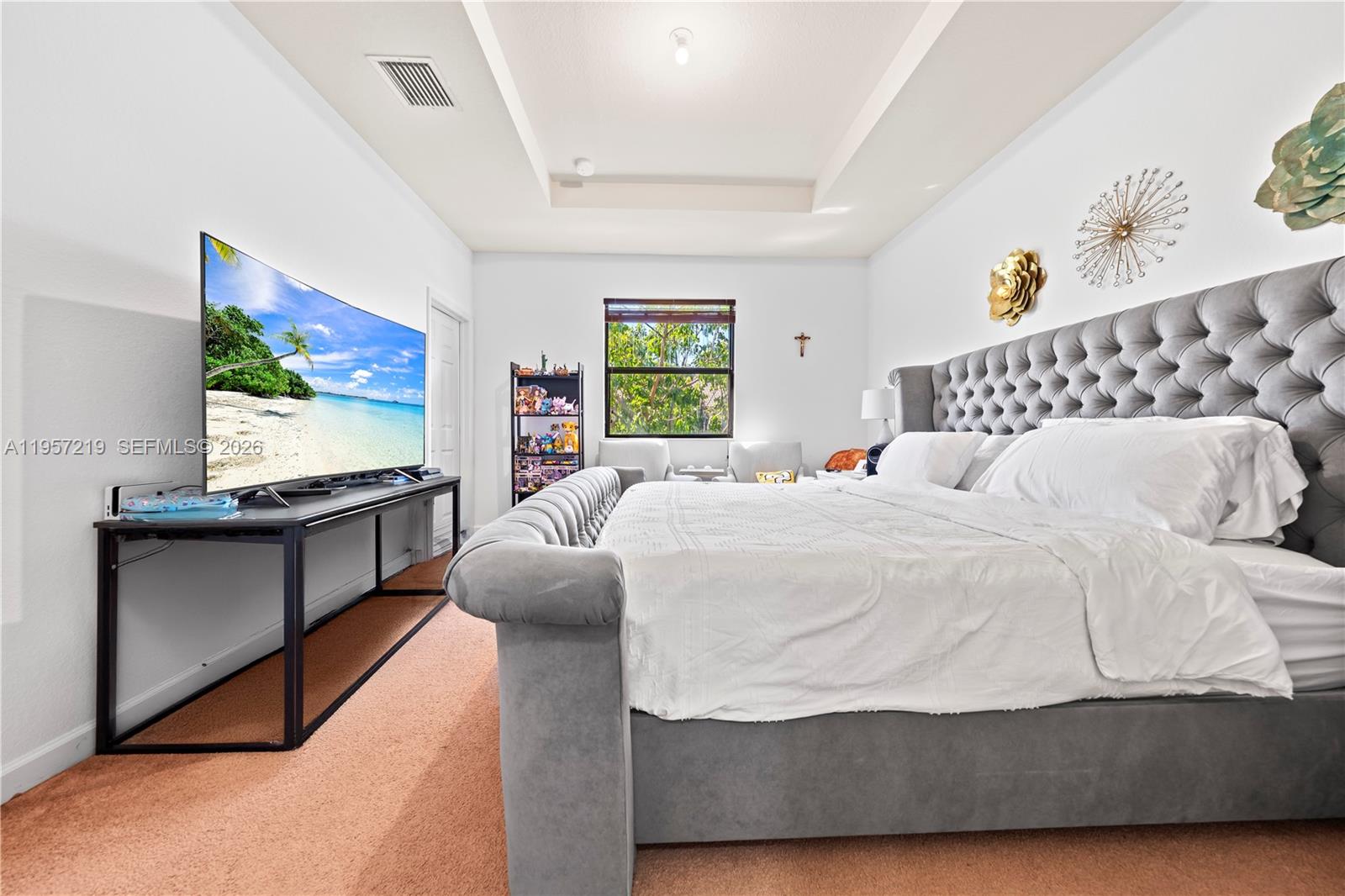 11734 Southwest 238 Street Homestead, FL 33032 - Photo 14 of 28 a bedroom with bed and window