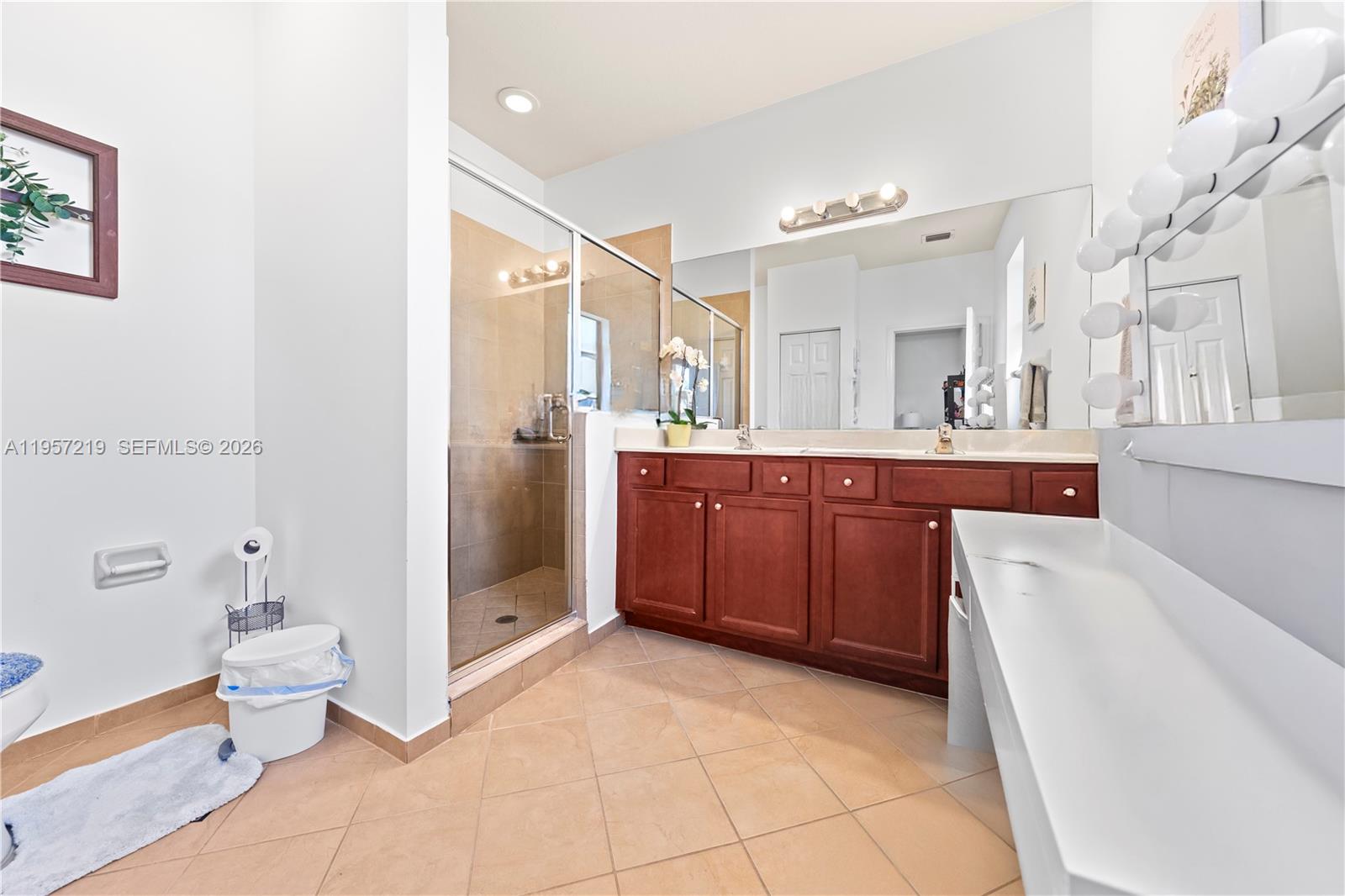 11734 Southwest 238 Street Homestead, FL 33032 - Photo 17 of 28 a large bathroom with a sink a toilet and shower