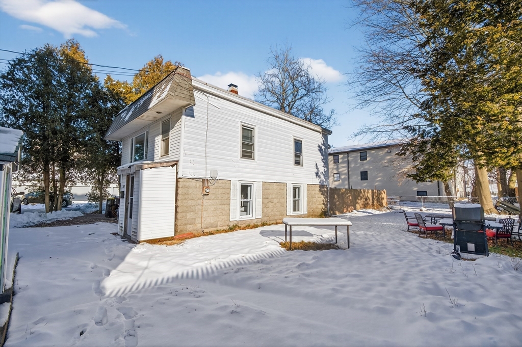 240 Montaup Street Fall River, MA 02724 - Photo 14 of 16 a view of a house with a patio