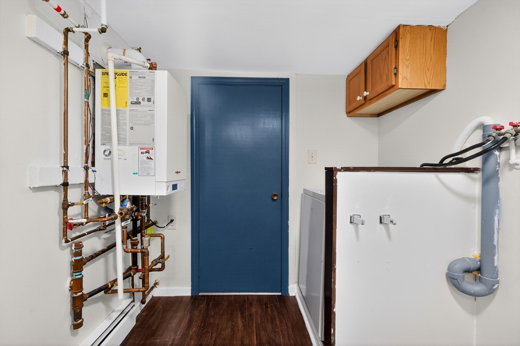 240 Montaup Street Fall River, MA 02724 - Photo 16 of 16 a view of hallway with wooden floor and stairs