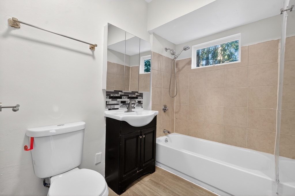 240 Montaup Street Fall River, MA 02724 - Photo 8 of 16 a bathroom with a sink toilet and shower