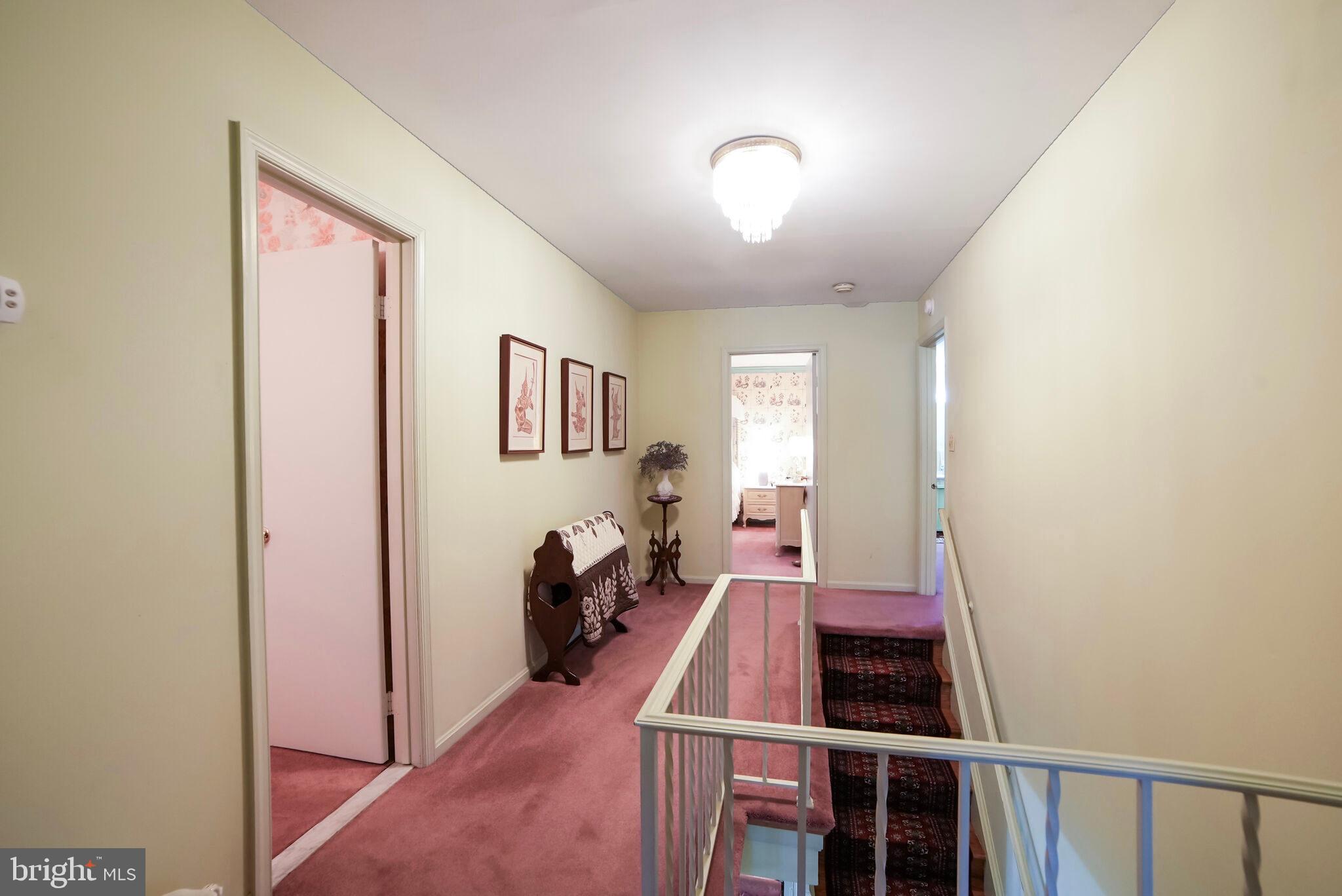11816 Prestwick Road Potomac, MD 20854 - Photo 19 of 38 Upper hall way opens to 4 bedroom & hall bathroom