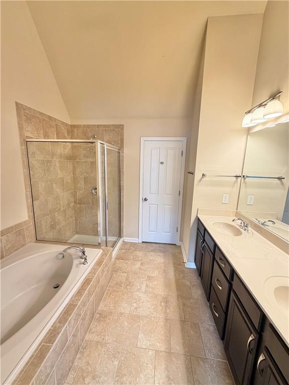 4954 Rosalie Road Alpharetta, GA 30022 - Photo 12 of 21 a bathroom with a tub sink and mirror