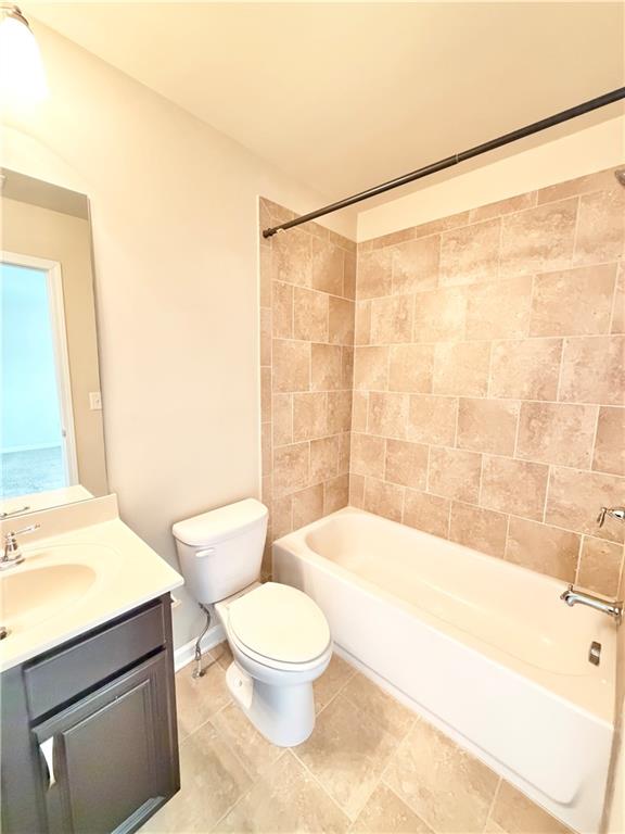 4954 Rosalie Road Alpharetta, GA 30022 - Photo 16 of 21 a bathroom with a sink a toilet and bathtub